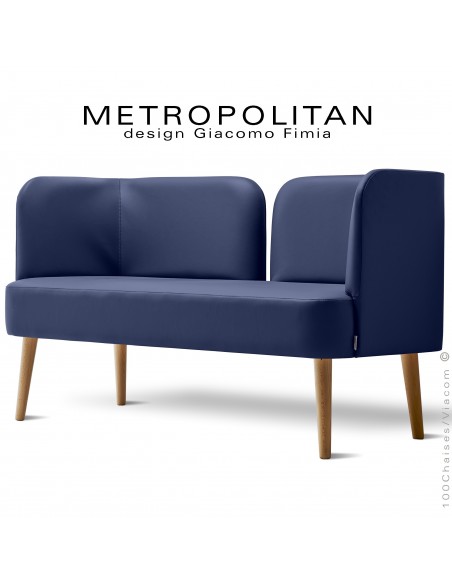 Banquette design METROPOLITAN, piétement bois naturel, habillage cuir synthétique couleur bleu foncé.