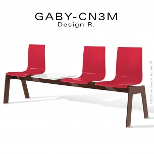 Banc ou assise sur poutre design GABY, piétement peint marron, assise coque plastique rouge avec tablette revue.