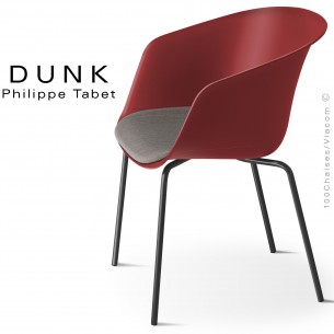 Fauteuil coque design DUNK, assise plastique rouge corail, piétement acier peint noir.