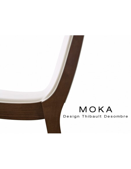 Détaille finition collection MOKA, chaise structure en bois assise capitonnée cuir couvrant collé.