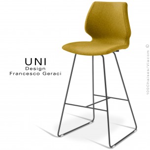 Tabouret UNI, piétement acier peint noir, assise plastique effet matelassé, habillage tissu Medley couleur jaune.