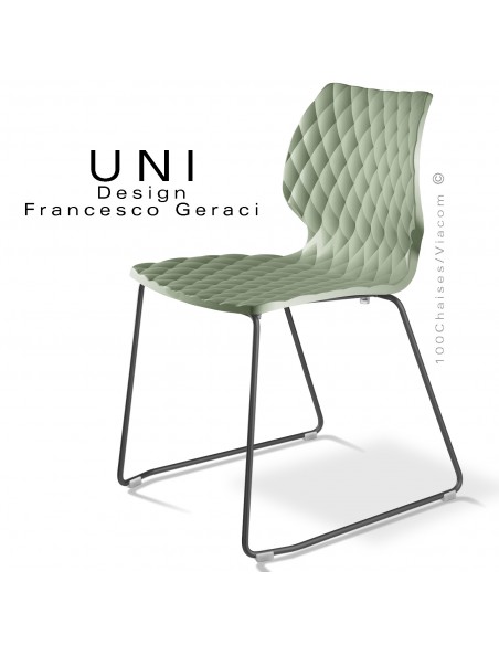 Chaise design UNI, piétement luge peint noir, assise coque plastique couleur vert pistache.