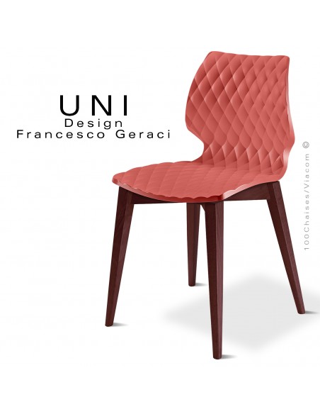 Chaise UNI, piétement bois de hêtre teinté brun, assise effet matelassé couleur rouge corail.