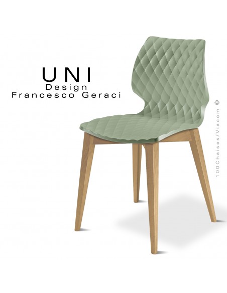 Chaise UNI, piétement bois de hêtre teinté châtaignier, assise effet matelassé couleur vert pistache.