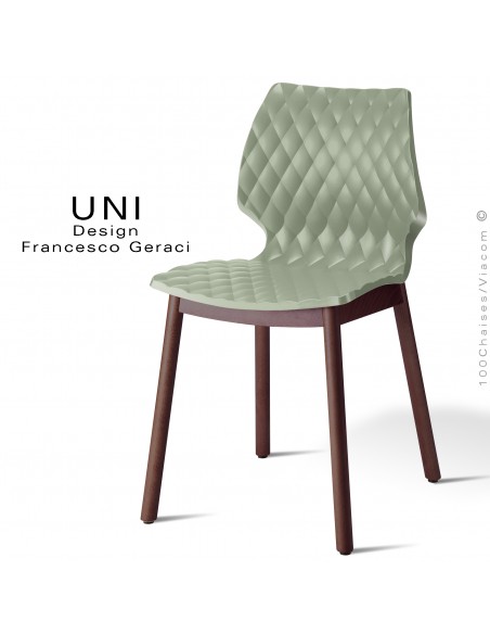 Chaise UNI, piétement bois teinté brun, assise coque effet matelassé couleur vert pistache.