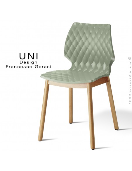 Chaise UNI, piétement bois teinté châtaignier, assise coque effet matelassé couleur vert pistache.