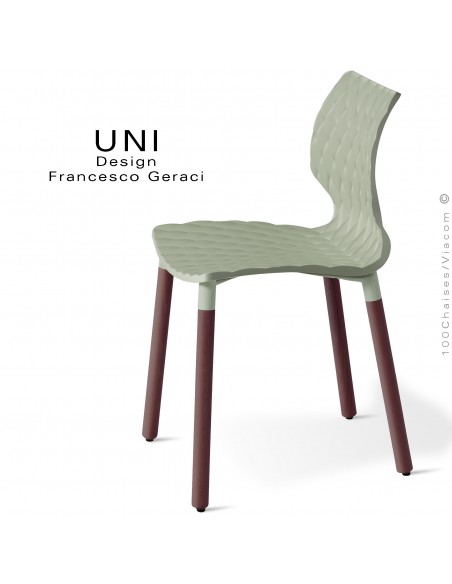 Chaise UNI, piétement bois de hêtre rond, vernis brun. Assise coque plastique effet matelassé couleur vert pistache.