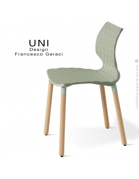 Chaise UNI, piétement bois de hêtre rond, vernis châtaignier. Assise coque plastique effet matelassé couleur vert pistache.