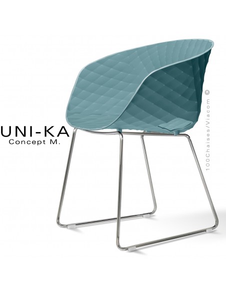 Fauteuil design UNIKA, coque plastique couleur bleu poudre effet matelassé, piétement luge chromé brillant.