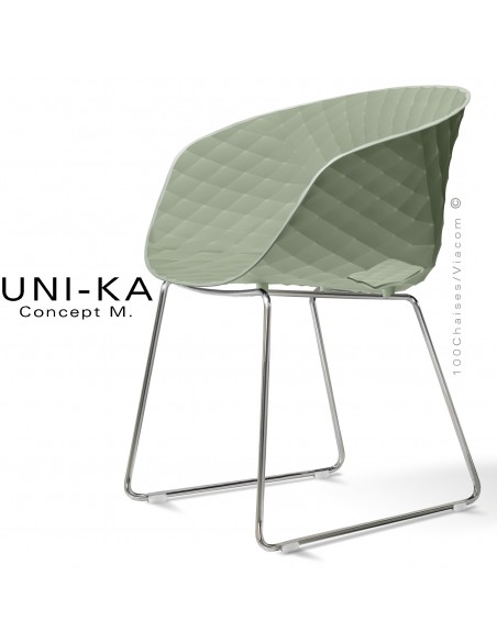 Fauteuil design UNIKA, coque plastique couleur vert pistache effet matelassé, piétement luge chromé brillant.